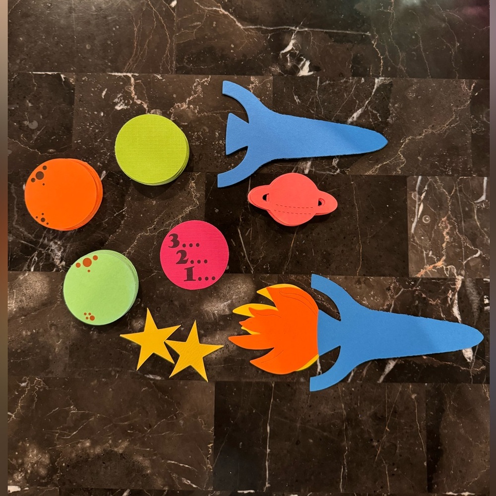 Handmade Paper Party Decorations -Space Theme. Rockets, Planets and Stars.